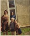 JM and family outside his garden studio